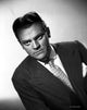 James Cagney portrait photo print in dark grey velvet suit with polka dot necktie