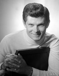 Dewey Martin smiling photo print showcasing classic film charm.