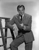 Karl Malden photo print by a ladder, capturing a classic moment.