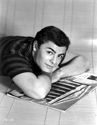 John Saxon lying on a book photo print