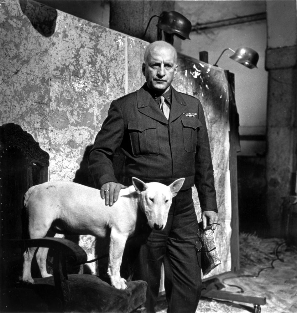 George C. Scott in military uniform with a dog photo print.