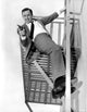 Robert Vaughn carrying a pistol film still photo print