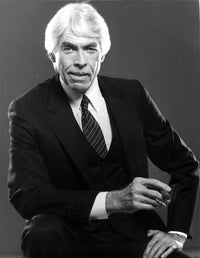 James Coburn wearing a suit photo print