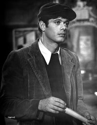 Film still of Michael Sarrazin wearing flat cap and suede jacket photo print.