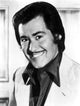Wyne Newton smiling photo print showcasing his joyful expression.