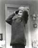 Classic portrait photo print of Ann Margret wearing a sweater and bull cap.