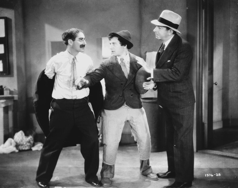 Marx Brothers Fighting Classic Portrait Photo Print showcasing legendary comedy.