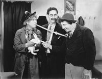 Marx Brothers scene photo print featuring a man holding a rabbit.