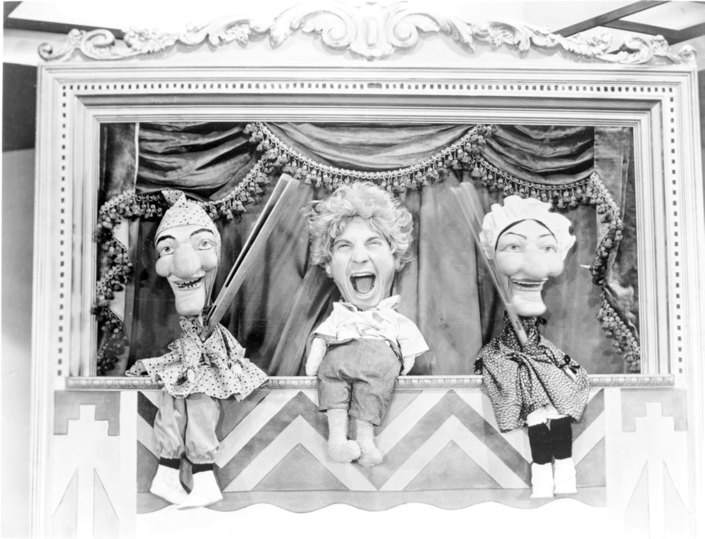 Marx Brothers Puppet Show Photo Print showcasing a whimsical scene.