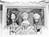 Marx Brothers Puppet Show Photo Print showcasing a whimsical scene.