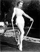 Virginia Mayo holding a skipping rope photo print.