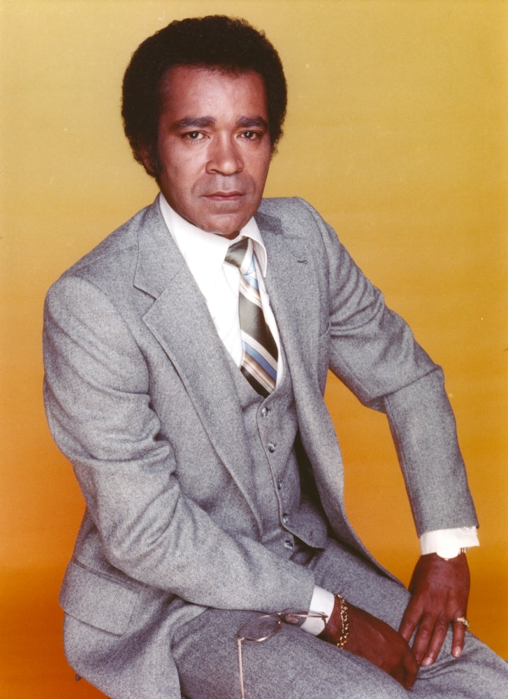 Greg Morris Posed in Tuxedo Photo Print showcasing classic elegance.