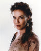 Connie Nielsen photo print in brown dress with white background.