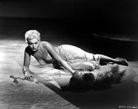 Kim Novak photo print lying down in a gown, classic Hollywood elegance.