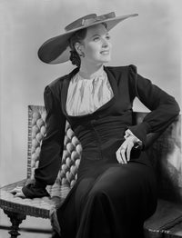 Maureen O'Hara classic photo print in black coat and hat.