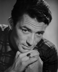 Close-up portrait photo print of Gregory Peck wearing a checkered polo.