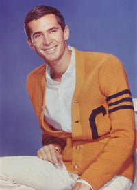 Anthony Perkins in a yellow coat photo print showcasing classic cinema.