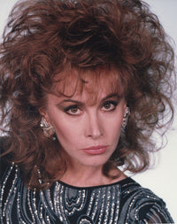 Close-up portrait photo print of Stefanie Powers looking serious.