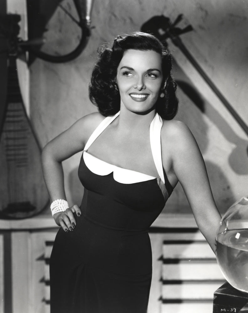 Jane Russell posed in a black linen strap dress with eyes looking to the right photo print