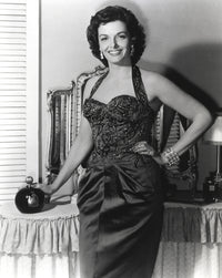 Jane Russell posed in a black velvet halter dress photo print.