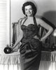 Jane Russell posed in a black velvet halter dress photo print.