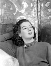 Rosalind Russell leaning on hand photo print