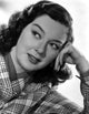 Rosalind Russell leaning on hand photo print, vintage Hollywood art.