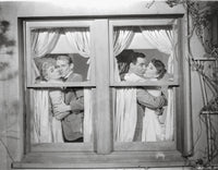 My Sister Eileen couple behind window pane photo print.