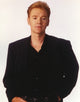 David Caruso posed in black coat with white background photo print