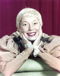 Carol Channing posed photo print on a red background.