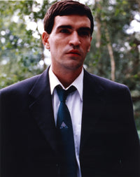 Ben Chaplin Portrait in Blue Coat Photo Print showcasing cinematic artistry.