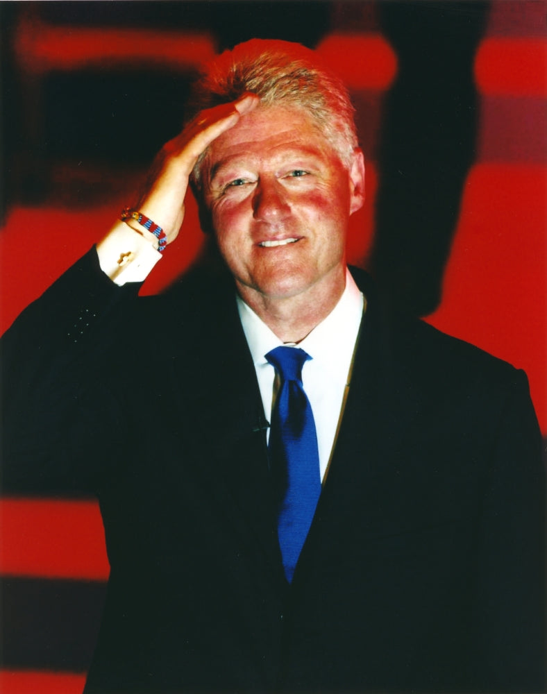 Bill Clinton posed in a black coat photo print.