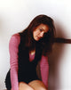 Kristen Cloke photo print in pink blouse, elegant and stylish.