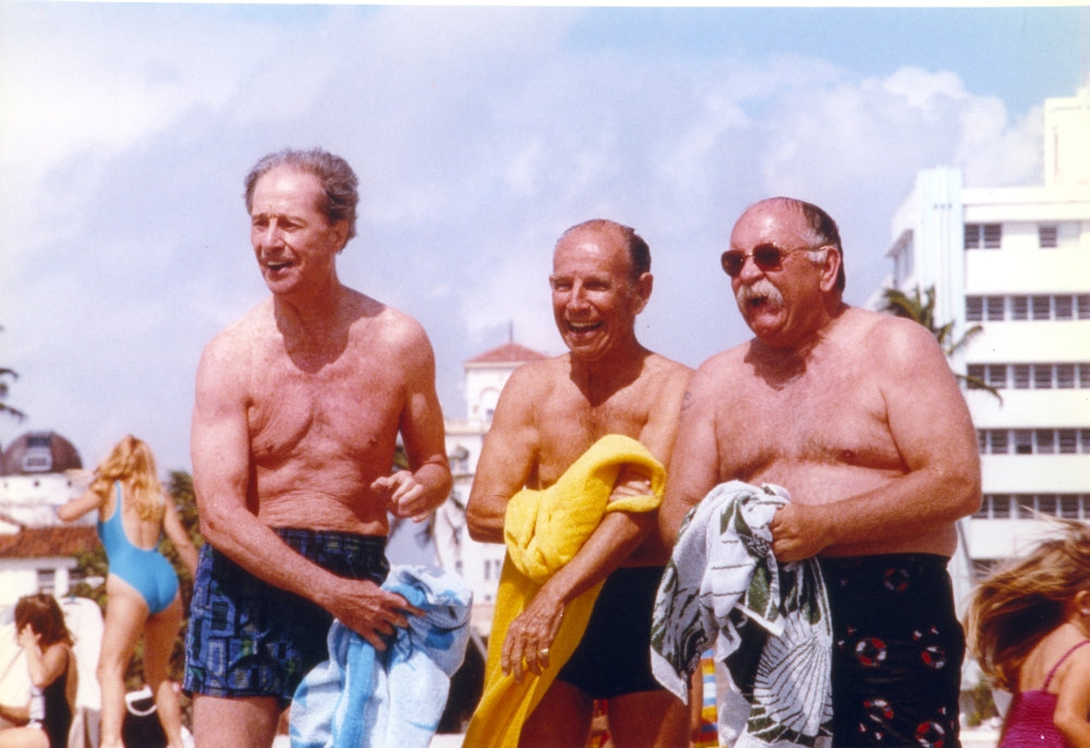 Cocoon Group Photo Print featuring a memorable topless scene