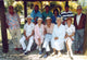 Cocoon Group Picture Under the Tree Photo Print showcasing friends or family under a tree.