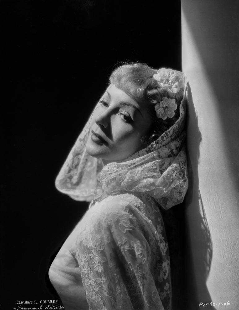 Claudette Colbert photo print in white with elegant background.