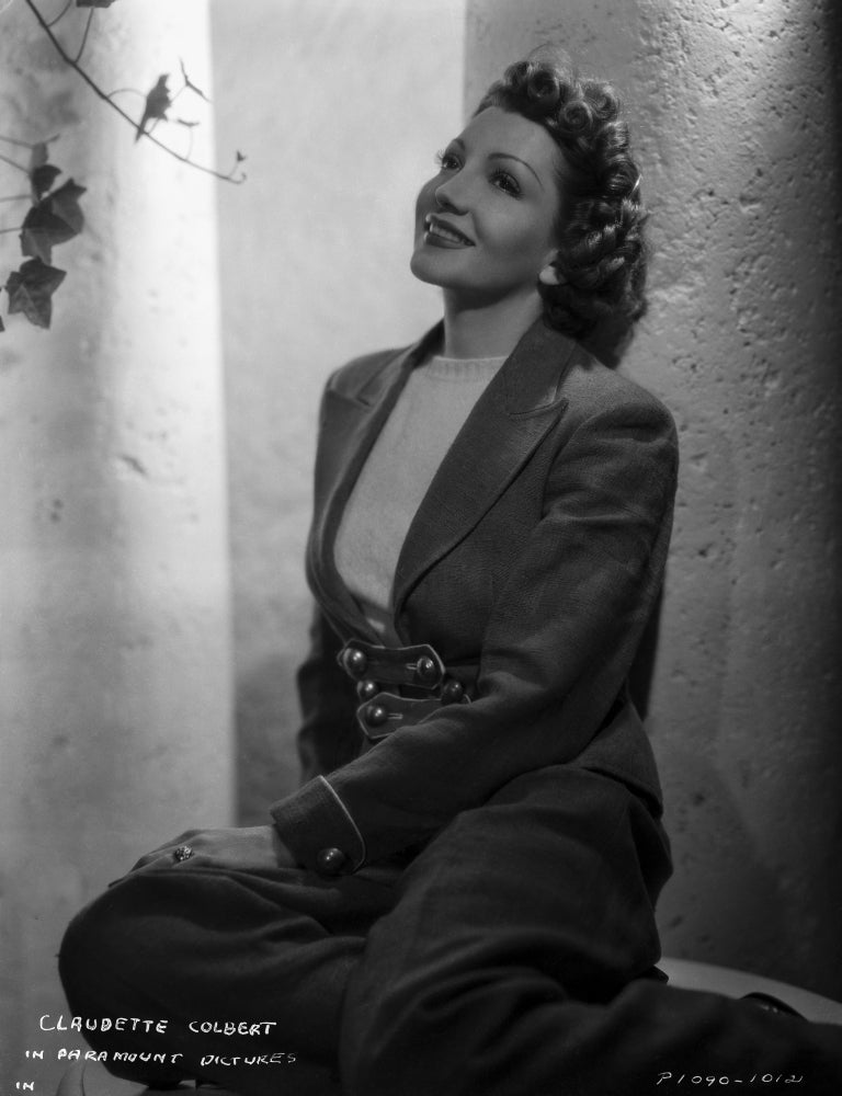 Claudette Colbert classic portrait photo print in sitting pose.