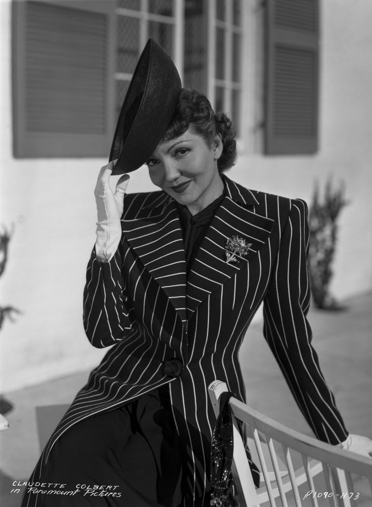 Claudette Colbert in Striped Suit Holding a Hat Photo Print