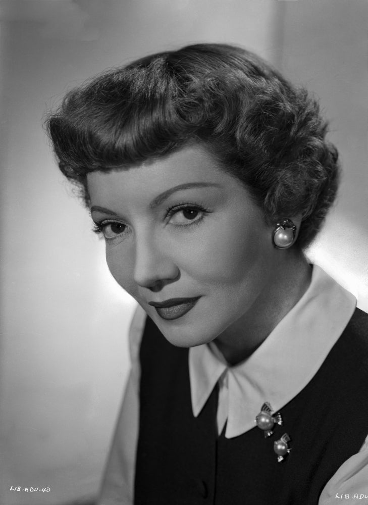 Claudette Colbert posed in black blazer and white long sleeve shirt photo print.