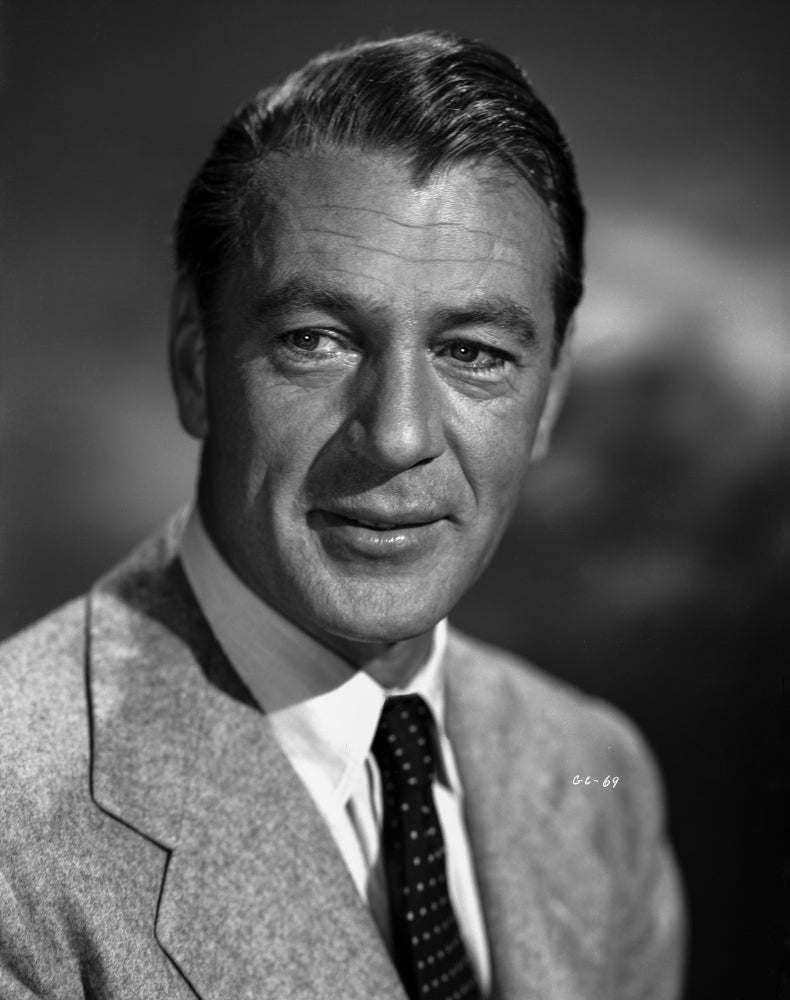 Gary Cooper charming portrait photo print in a suit, slightly smiling.