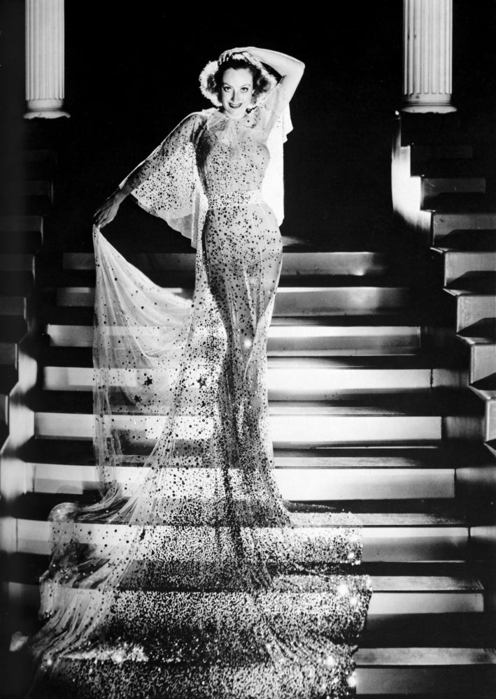 Joan Crawford wearing a sheer dress on a staircase - Vintage Photo Print