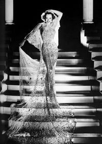 Joan Crawford wearing a sheer dress on a staircase - Vintage Photo Print