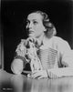 Joan Crawford leaning on a table photo print