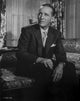 Bing Crosby seated in tuxedo portrait photo print