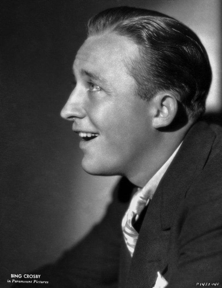 Bing Crosby smiling portrait photo print in tuxedo side view.
