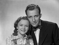 Bing Crosby smiling in formal wear with daughter portrait photo print.