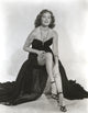 Rhonda Fleming elegant photo print in evening gown and high heels.