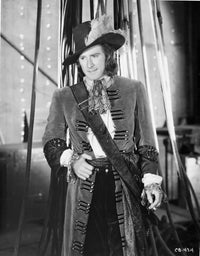 Film still photo print of Errol Flynn in classic cinema.