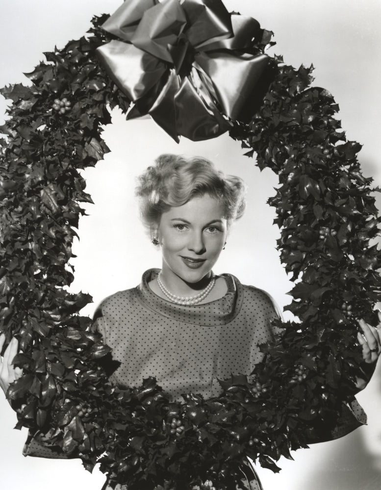 Joan Fontaine photo print holding a big wreath, classic Hollywood art.