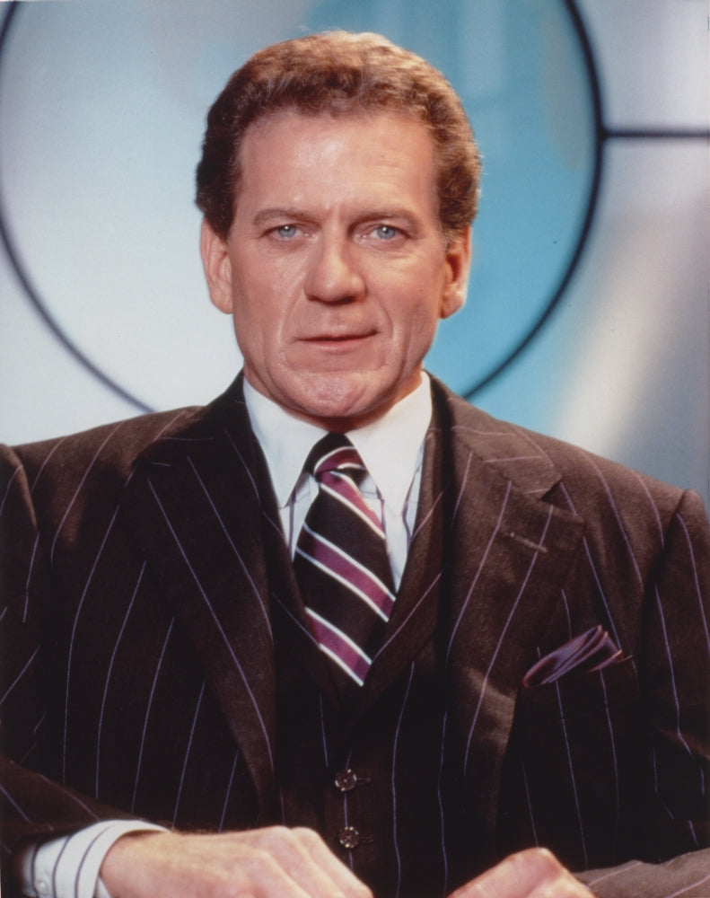 Portrait photo print of Robert Foxworth in a formal suit.